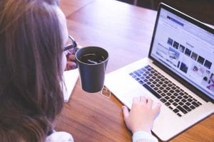 Woman looking at a computer